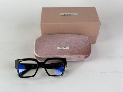 MIU MIU - Paire de lunettes de vue, étui et boite.