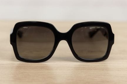 GUCCI - Paire de lunettes de soleil, monture noire