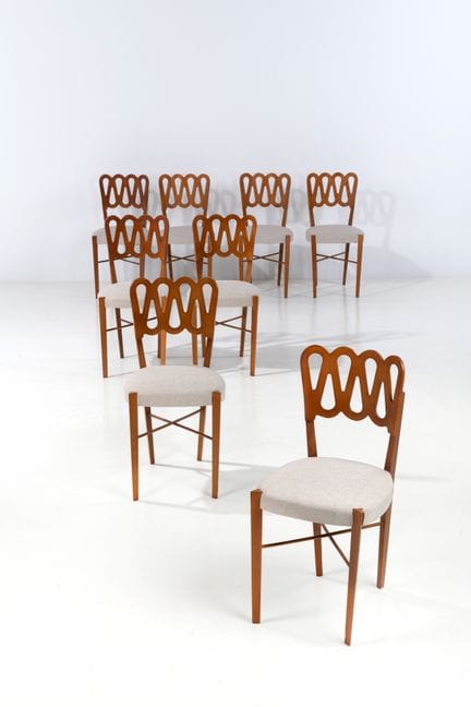 吉奥·庞蒂（1891-1979）
八把椅子套装——969型
胡桃木与纺织品
蒙蒂纳版
设计于1936