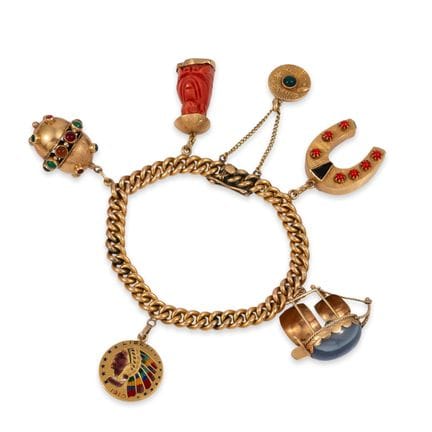 BRACELET EN OR AVEC PENDENTIFS
Bracelet à maillons