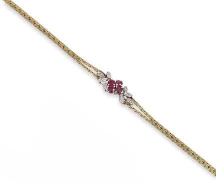 BRACELET EN OR 14 CARATS BICOLORE AVEC DES RUBIS
B