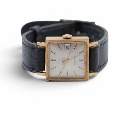 TISSOT 
WATCH  in gold (750‰), square bezel,  silv