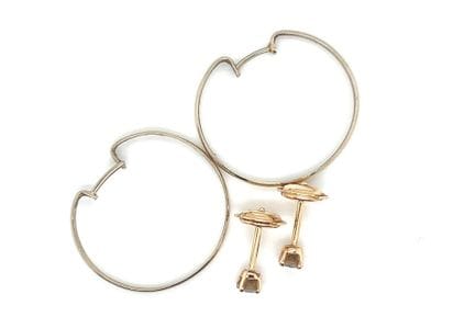 Pair of gold (750‰) EARRINGS set with small brilli