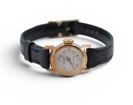 YRIE
Women's gold watch (750‰), round bezel, silve