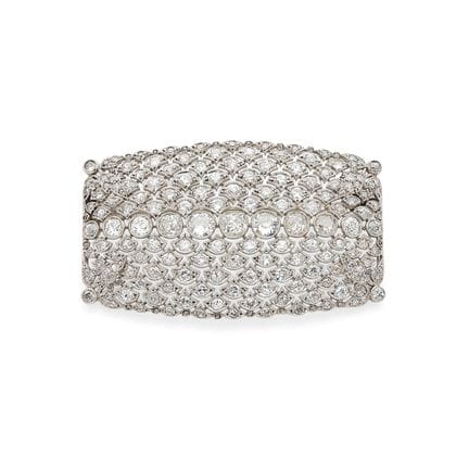 BROSCHE „ÉCAILLE“

Diamanten im Antikschliff
Plati