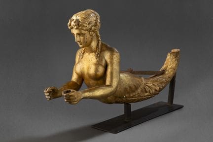 GALIONENFIGUR

Aus geschnitztem und vergoldetem Ho