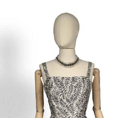 CHRISTIAN DIOR

Collier trois rangs

En métal arge