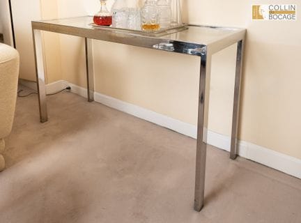 Konsole aus Chrom und Glas. Um 1980
126 x 50 x 73 