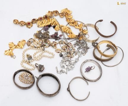 two pouches of costume jewelry