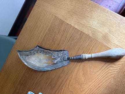 Silver pie server, Minerva hallmark.