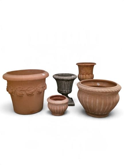 Set of four planters and a baluster vase.