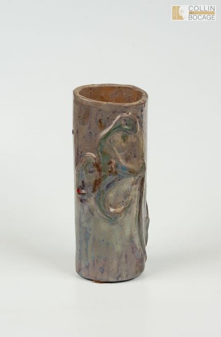 Cylindrical vase decorated with a relief iris desi