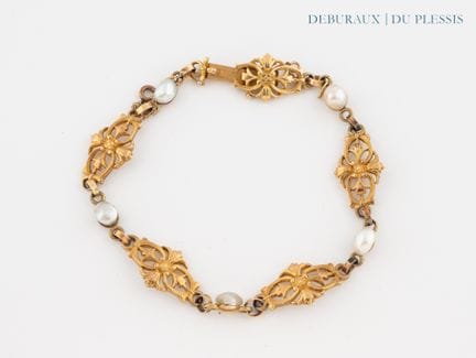 Bracciale in oro 750°/°° con maglie articolate a m