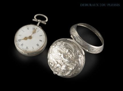 Orologio a cipolla in argento cesellato, movimento
