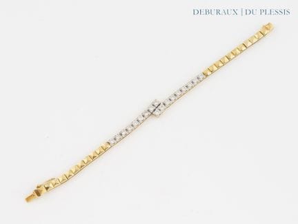Bracciale a linee incrociate in oro 750 °/°° con m