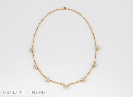 Collana a drappeggio in oro 750°/°° con maglia for