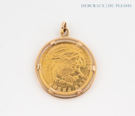 Ciondolo in oro 750°/°° decorato con una moneta "R