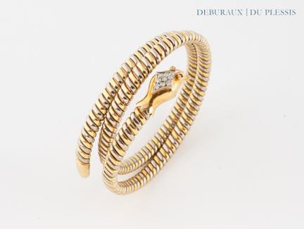 Bracciale a forma di serpente in oro bicolore 750°