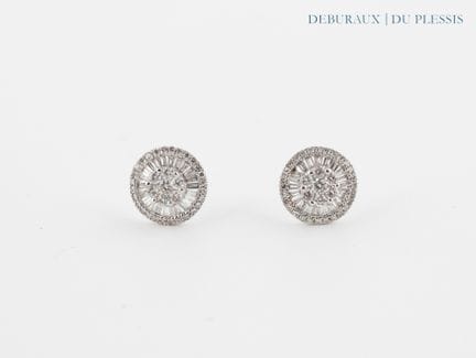 Coppia di orecchini in oro bianco 750°/°° con diam