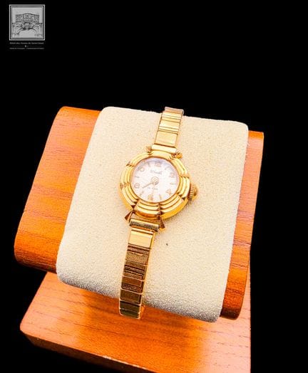 DERMONT
Montre de dame 
Boîtier en or jaune et gri
