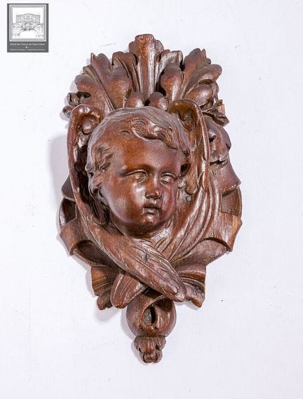 Angelot en chêne sculpté réalisé en 2 parties 
Epo