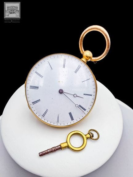 Montre à gousset
Or jaune 18K 750/°°° et cache pou