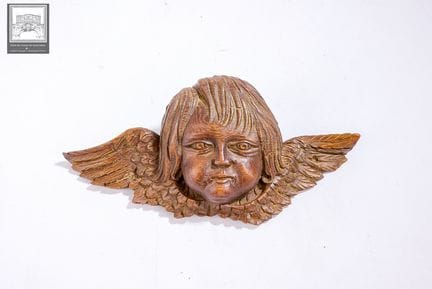 Angelot en chêne sculpté 
Epoque XIXe siècle 
Dim.