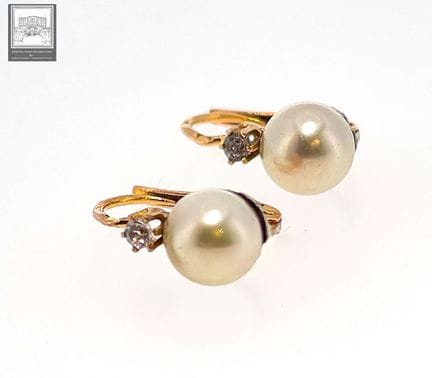 Ein Paar Ohrringe aus 18-karätigem Gold 750/°°°
Mi
