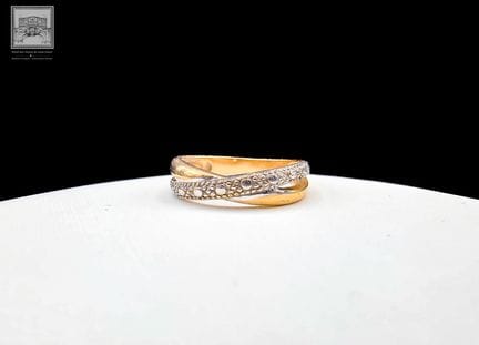 Ring
18 Karat Gelb- und Graugold 750/°°°
Größe: 51