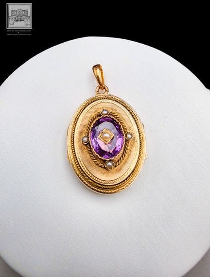 Pendentif porte photo en or 18K 750/°°°
Poinçon tê