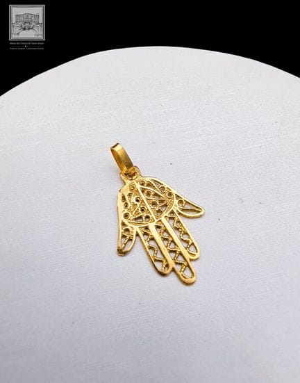 Anhänger aus 18 Karat Gelbgold (750/°°°) in Form d