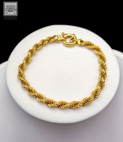 Armband aus 18 Karat Gelbgold (750/°°°), mit Adler