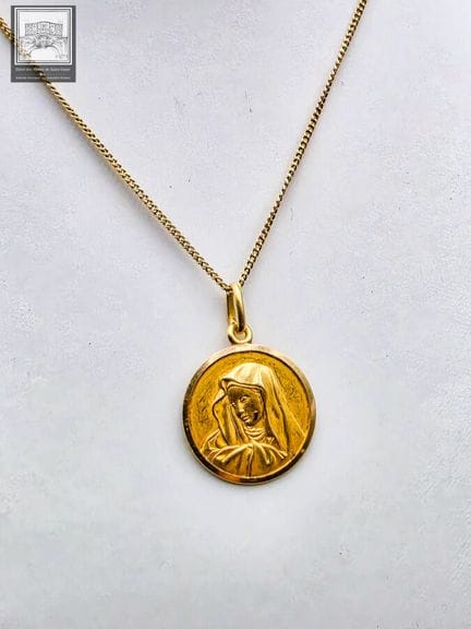 Collier + pendentif en or jaune 18K 750/°°° 
Poinç