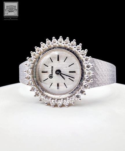BEUCHAT
 Montre-bracelet de dame 
Or gris 18 k 750