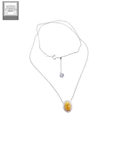 Joli collier en or blanc 750°/.(18K) 1g90 orné d'u
