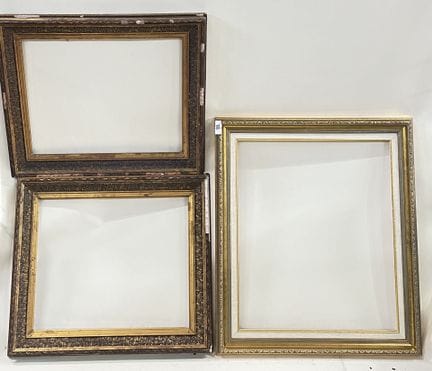 Set of three stuccoed and gilded wood frames. 
H 5