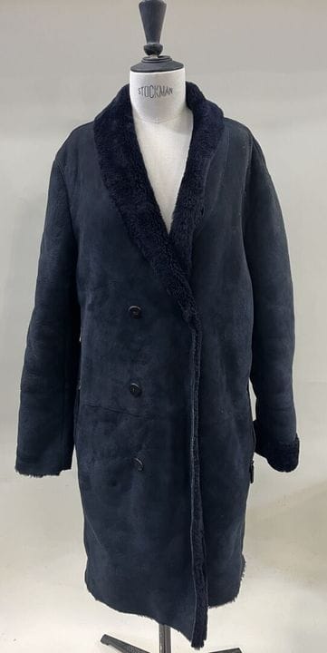 ARMANI COLLEZIONI.
Un manteau pour femme en cuir e