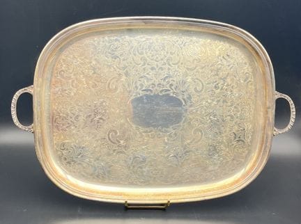 A rectangular serving tray made of silver plated m