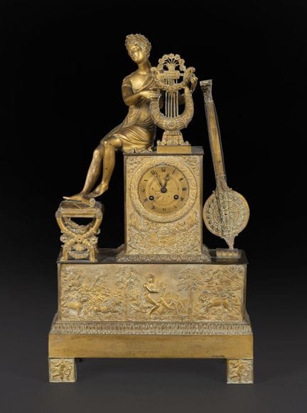 Pendule borne en bronze doré représentant Apollon 