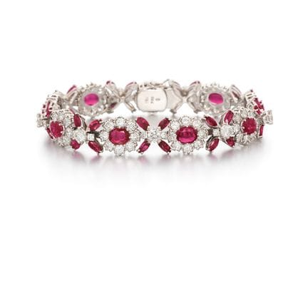 BRACCIALE CON MOTIVI FLOREALI, RUBINI E DIAMANTI

