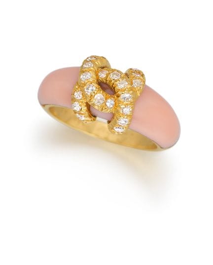 CARTIER

Titolo: Anello con corallo e diamanti.
Pr