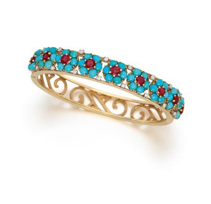 BRACCIALE CON PIETRE PREZIOSE E MOTIVI FLOREALI

D