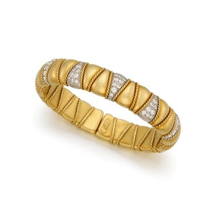 BRACCIALE A CERCHIO CON DIAMANTI BICOLORE

Materia