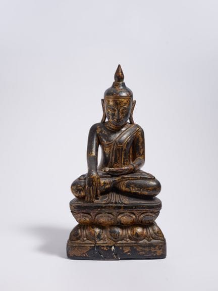 THAÏLANDE

Titre : Bouddha assis en bois sur un so