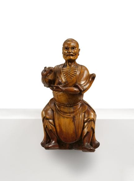 CHINE

Titre : Figurine en bois représentant une d