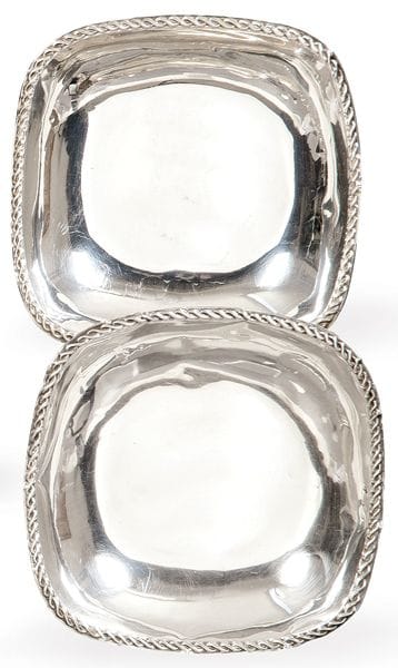 Two small, square centerpieces in Spanish silver, 