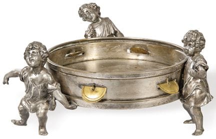 Silver-plated metal centerpiece in the shape of a 