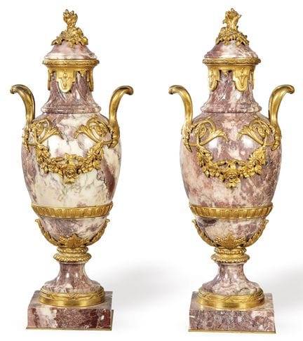 Pair of urns in pink and white veined marble and b