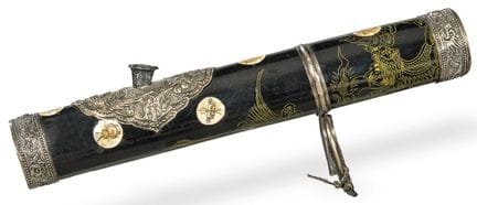 Opium pipe made of horn, bone, and silver. 
 With 