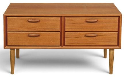 Low four-drawer chest in teak, with slightly taper